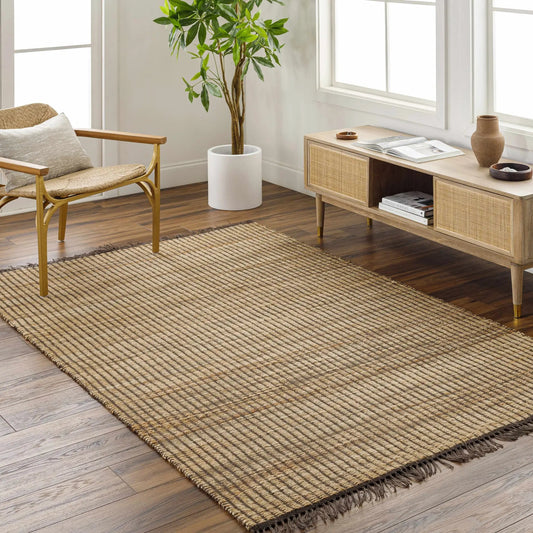 Mihal Jute Rug handwoven in multiple colors with natural texture in a bright living room on Tampa Home & Garden Store