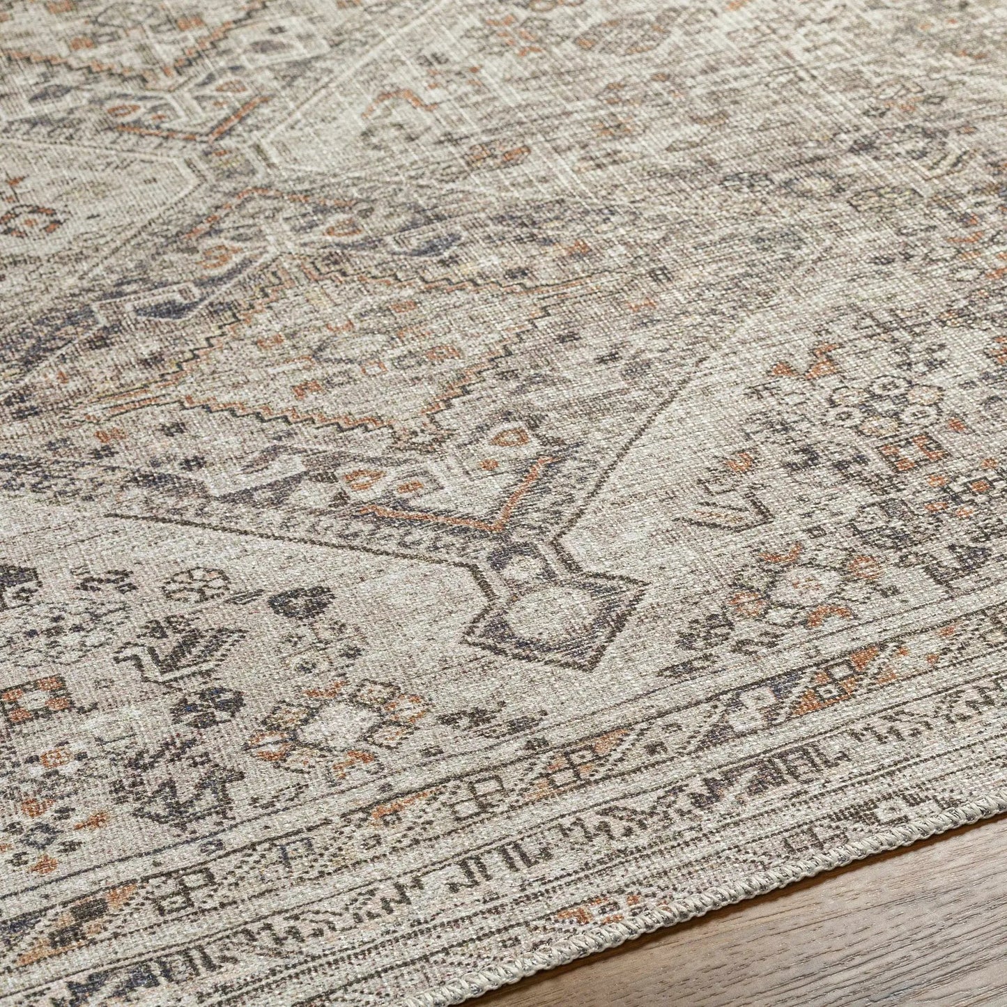 Barny Beige flat-pile washable rug with distressed medallion pattern on Tampa Home & Garden Store