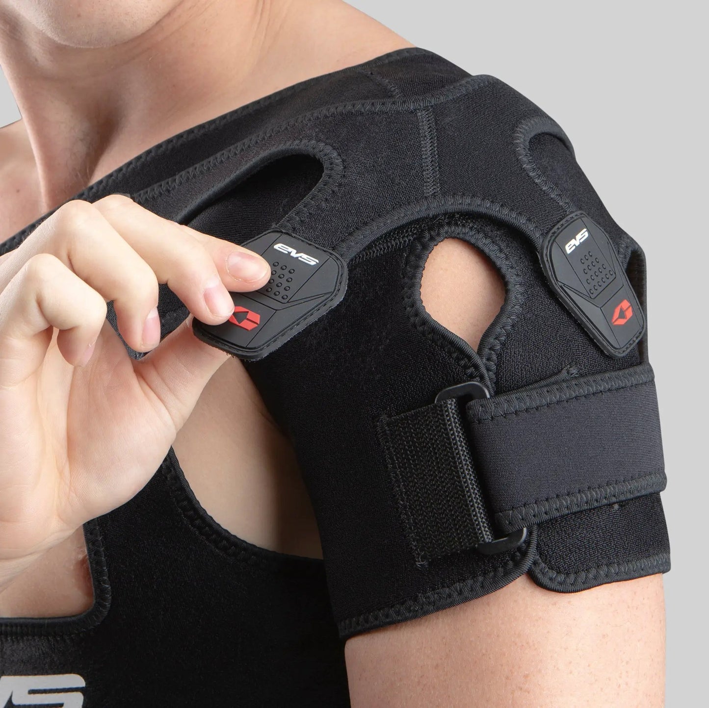 SB03 Shoulder Support with X Strap in black neoprene, EVS Sports branding visible on strap on Tampa Home & Garden Store