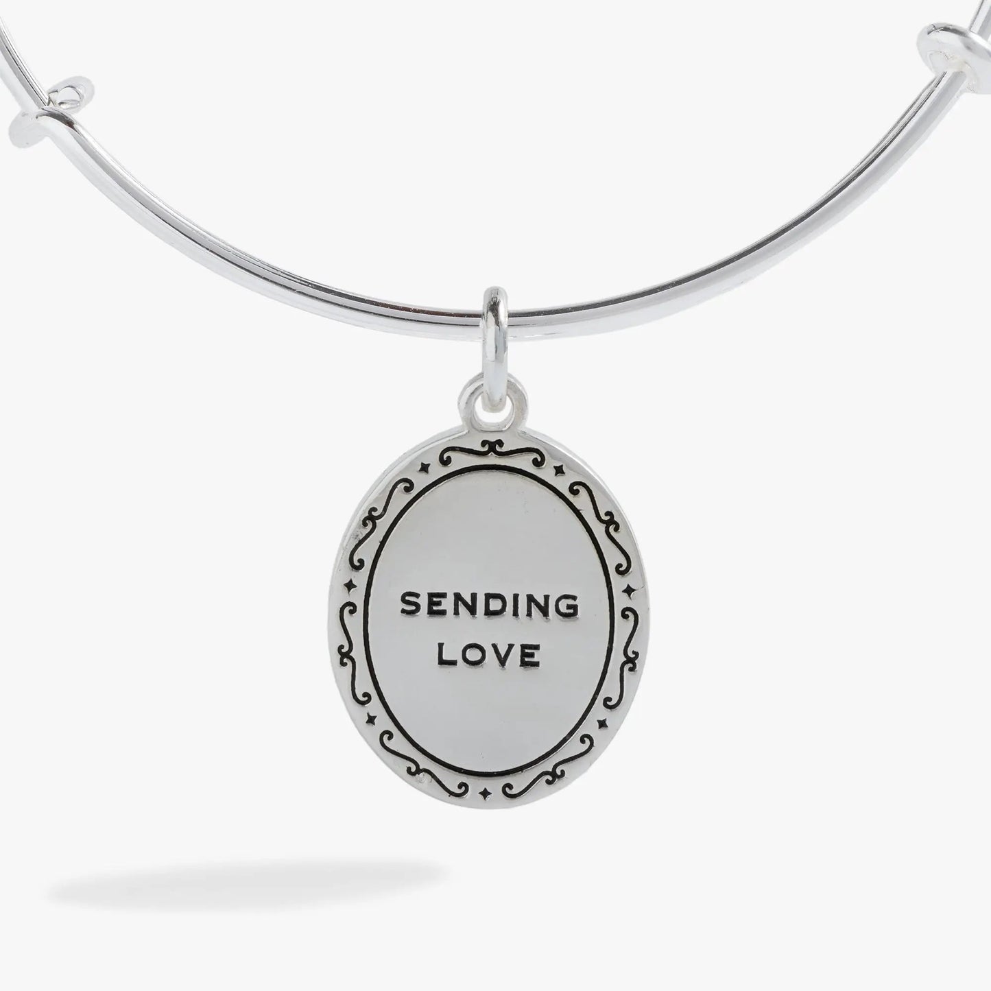 Sending Love Charm Bangle silver-tone bracelet with oval pendant engraved SENDING LOVE on Tampa Home & Garden Store