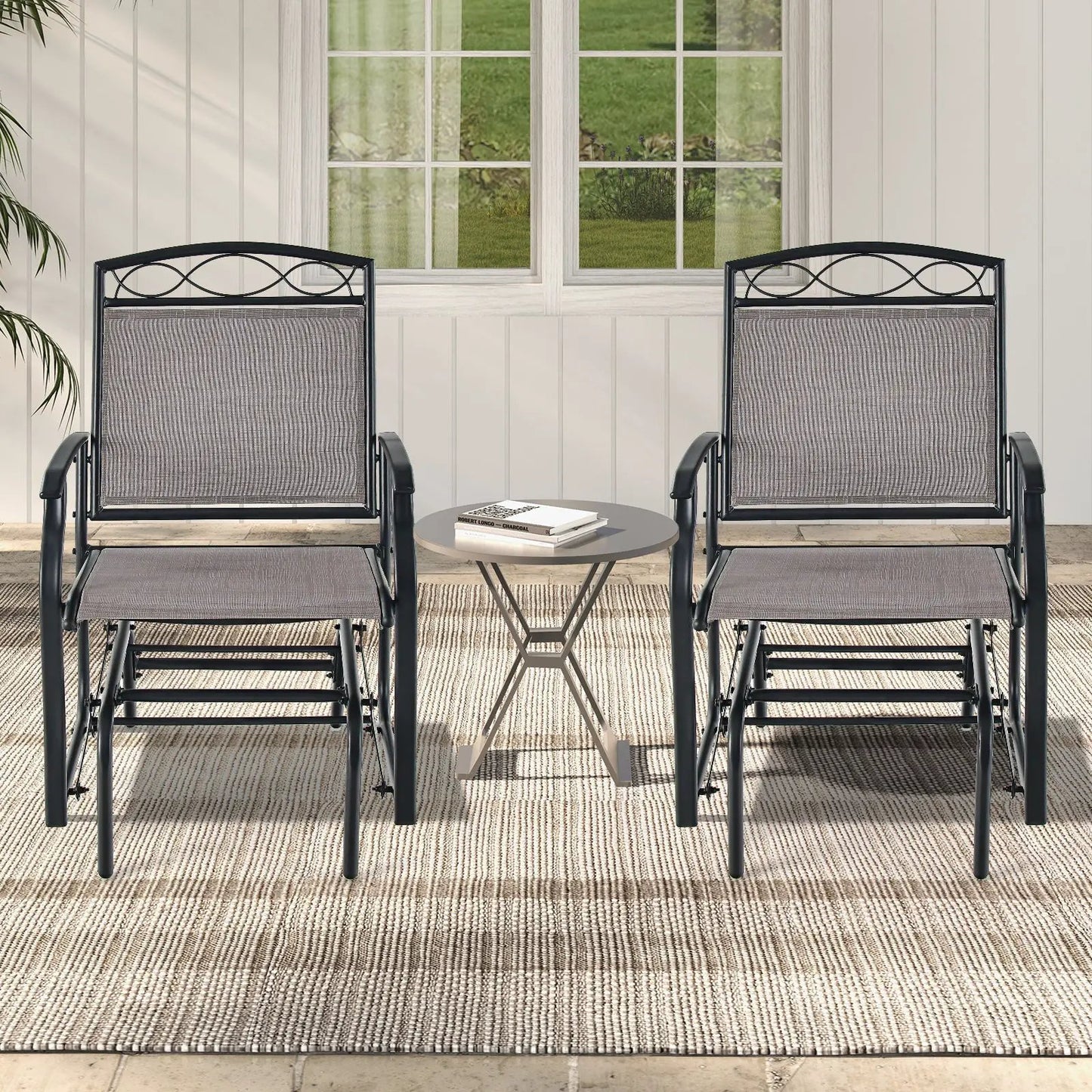 Set of 2 outdoor metal glider armchairs with dark frames and gray woven mesh seating on Tampa Home & Garden Store
