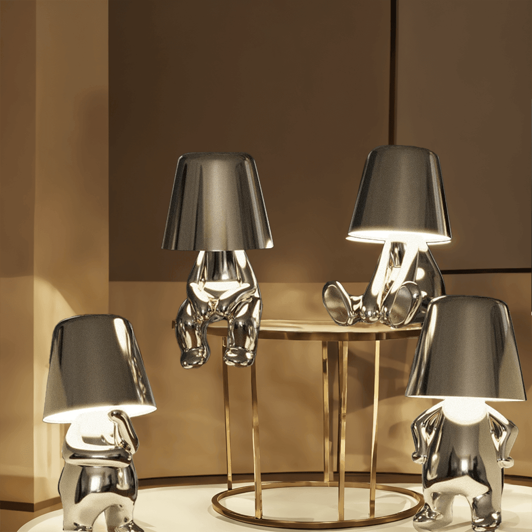 Silver Thinker LED Table Lamps Set with chrome figures and gray shades on a gold base on Tampa Home & Garden Store