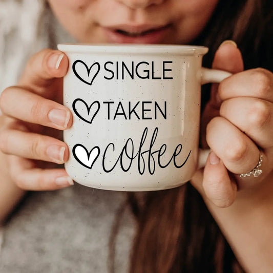 Single Taken Coffee ceramic mug with white speckled finish and heart icons on Tampa Home & Garden Store