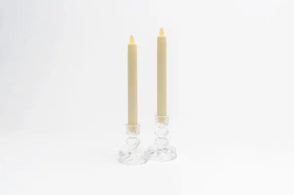 Swirl Glass Taper Holder pair with beige candles, clear glass bases on Tampa Home & Garden Store