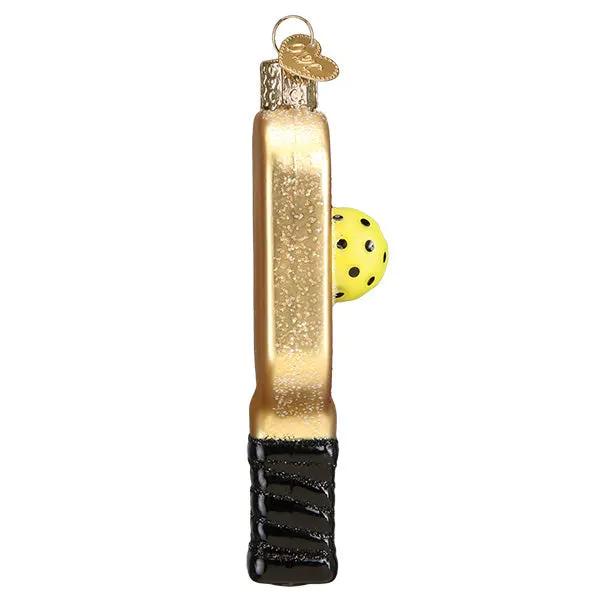 Delightful pickleball paddle ornament gold paddle with black grip and yellow ball on Tampa Home & Garden Store