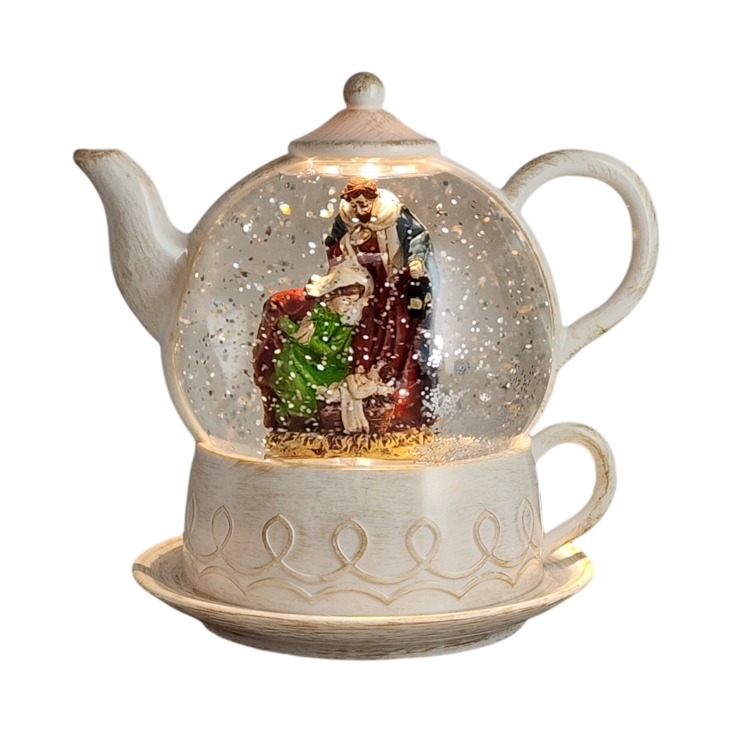 Lighted Water Globe Teapot Nativity Scene with spinning figures inside a frosted cream globe on Tampa Home & Garden Store
