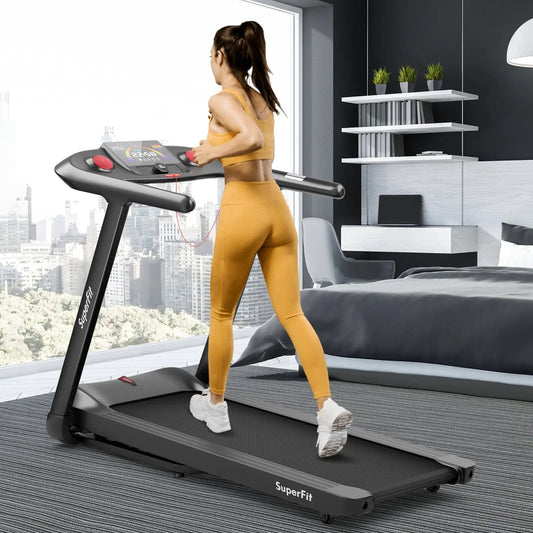 4.75HP folding treadmill with touchscreen, black frame, SuperFit brand in a modern bedroom on Tampa Home & Garden Store