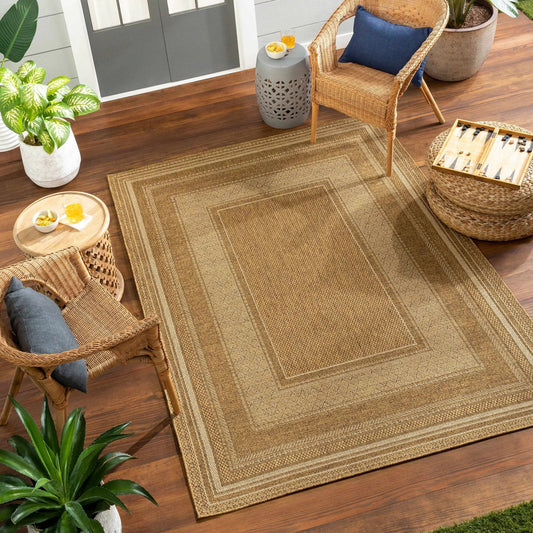 Chael flatweave faux jute outdoor rug natural beige under wicker seats on Tampa Home & Garden Store