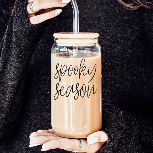 Spooky Season 20oz tumbler with glass jar, wood lid, metal straw and beige beverage on Tampa Home & Garden Store