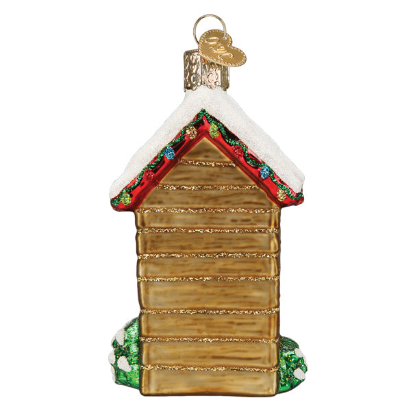 Old World Christmas Outhouse Glass Ornament with snow-covered roof on Tampa Home & Garden Store