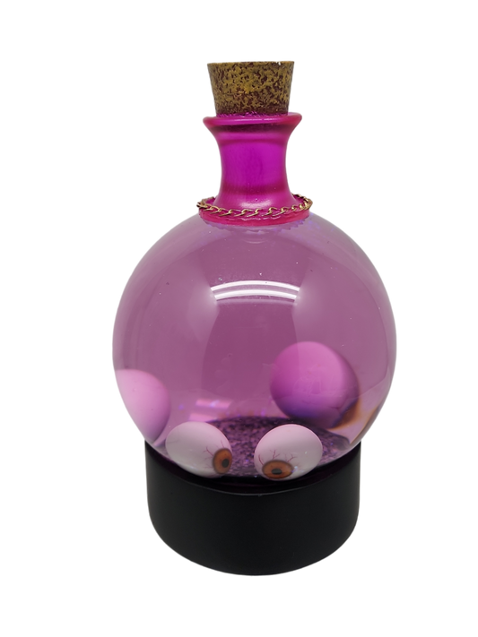 Glass Potion Glitterdome with Eyeballs, pink-purple bottle with cork and chain collar on Tampa Home & Garden Store