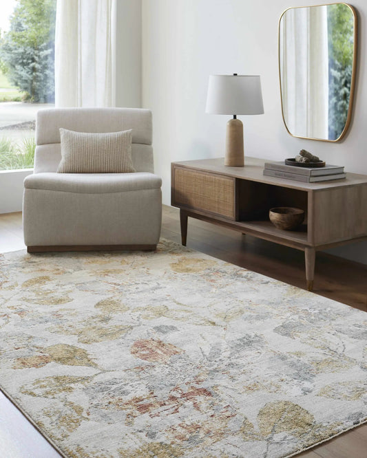 Ouida Floral Rug by Boutique Rugs in mustard, rust, teal and gray on a cream background on Tampa Home & Garden Store