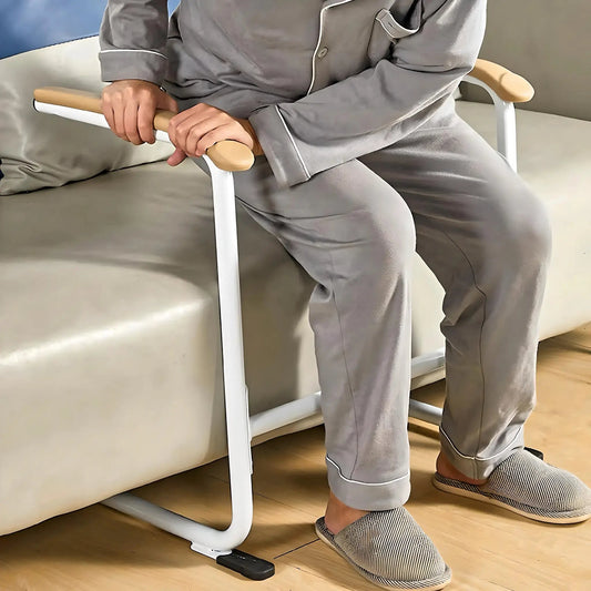StandEase Assist stand aid for seniors, white frame with wooden grips, indoor use on couch on Tampa Home & Garden Store