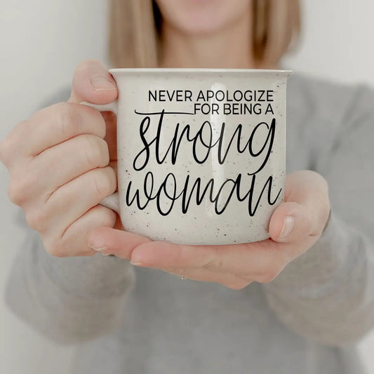 Strong Woman ceramic coffee mug with speckled white glaze and bold script text on Tampa Home & Garden Store