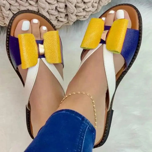 Sandals Stevvex butterfly knot flat sandals pair in yellow white blue accents on Tampa Home & Garden Store