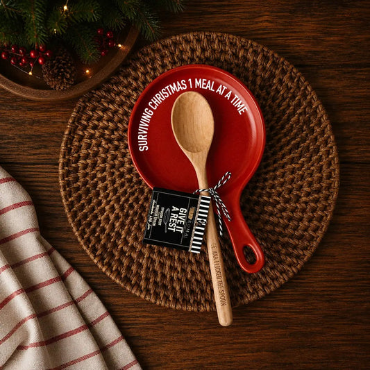Surviving Christmas spoon rest with wooden spoon, red round dish with white slogan Gia Roma on Tampa Home & Garden Store