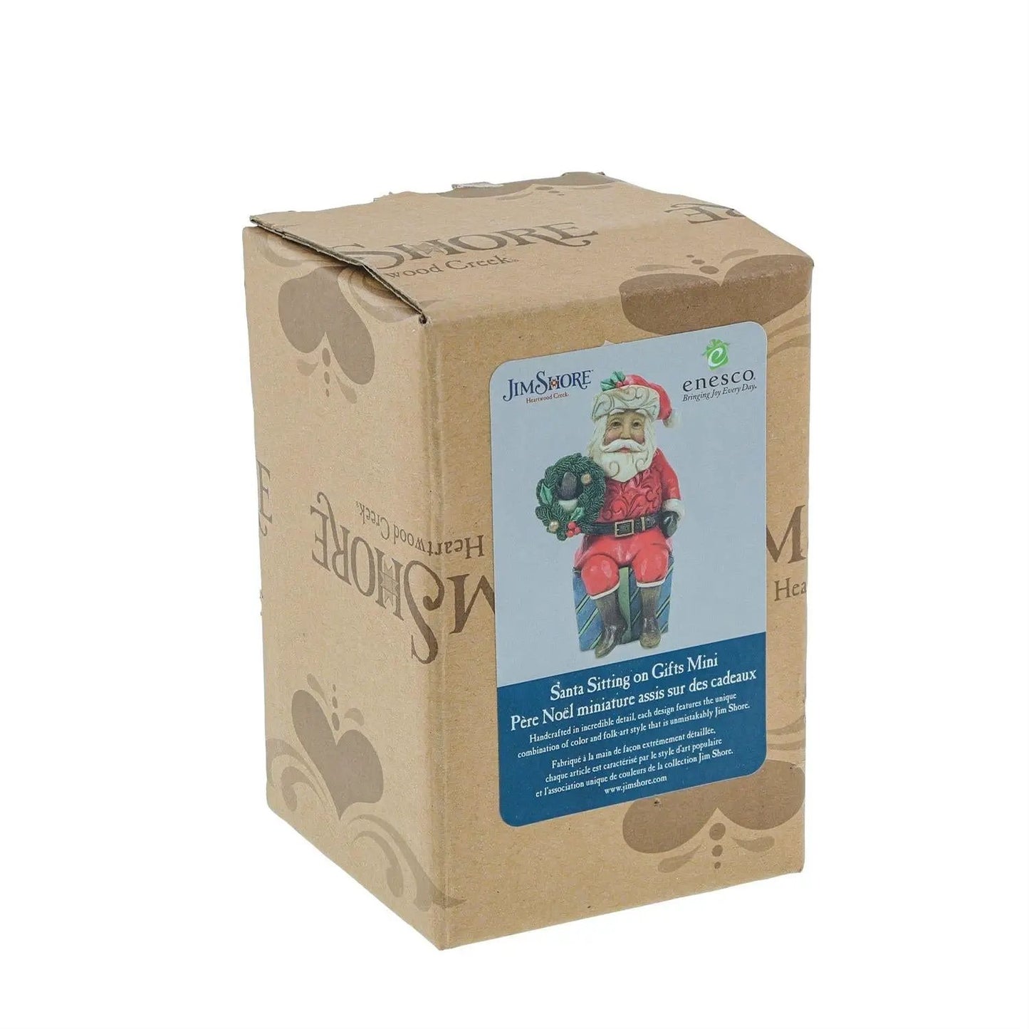 Santa Sitting on Gifts Mini Figurine hand painted by Jim Shore for Enesco on gift-box packaging on Tampa Home & Garden Store