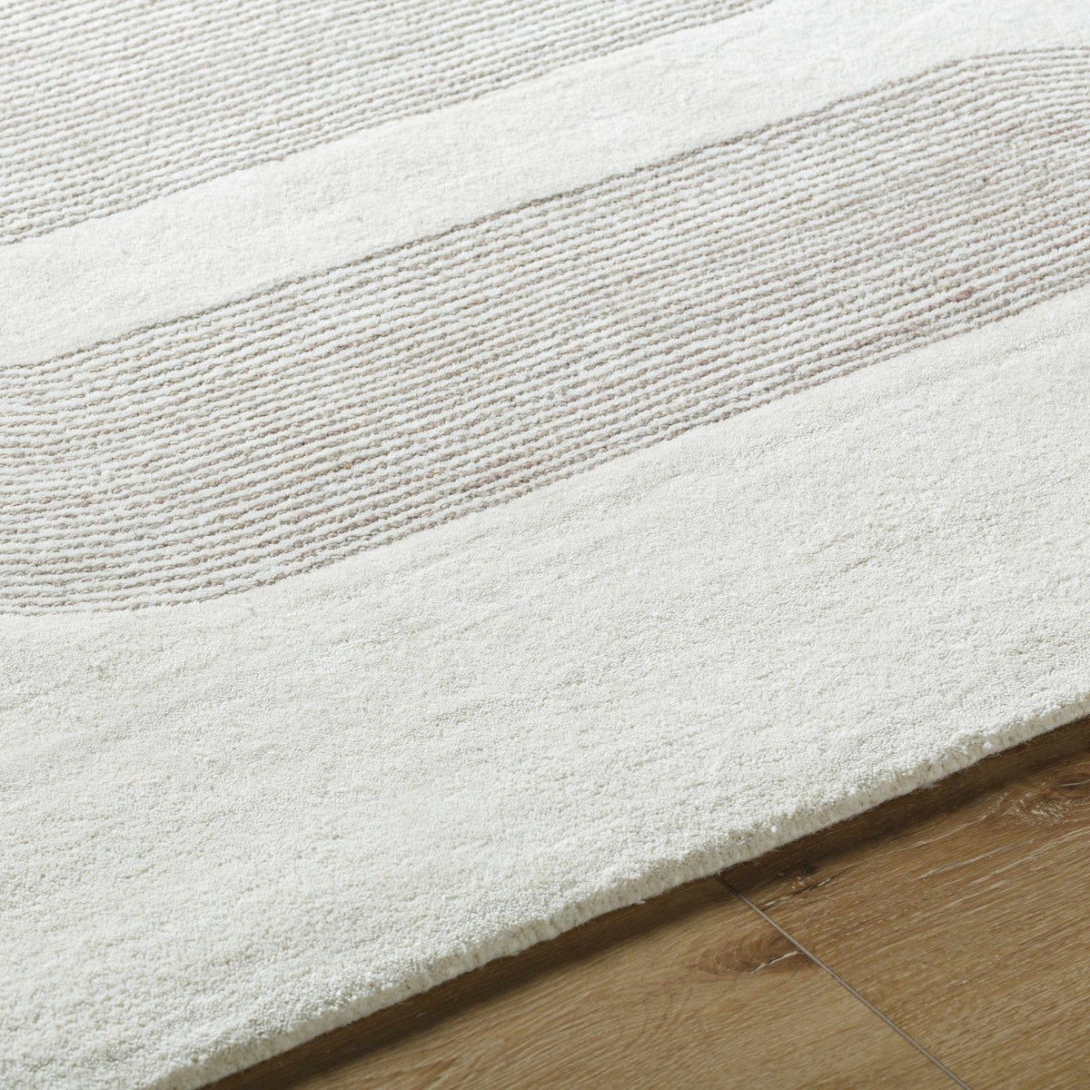Saura Area Rug cream with subtle striped texture by Boutique Rugs on Tampa Home & Garden Store