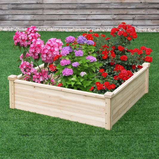 Wooden square garden bed by DirectDeals in natural wood, filled with pink red purple flowers on Tampa Home & Garden Store