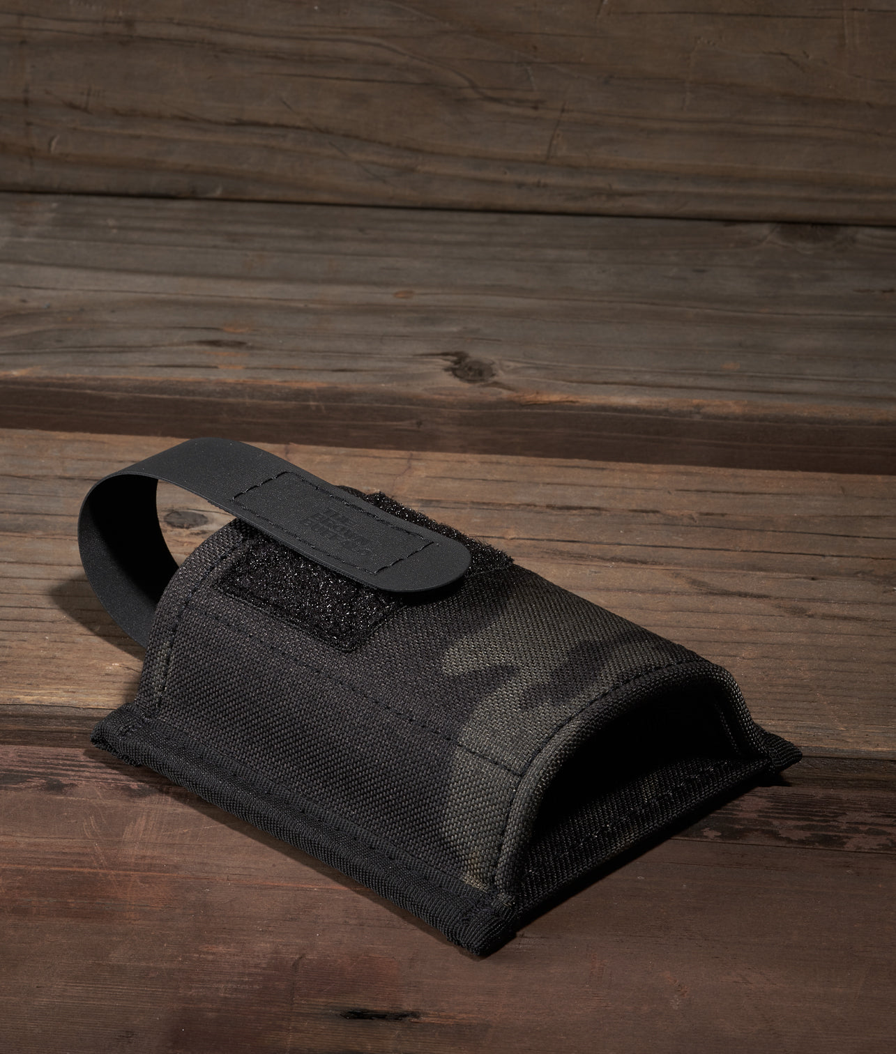 Muzzle Mask, black nylon accessory with Velcro strap and loop handle by The Brown Buffalo on Tampa Home & Garden Store