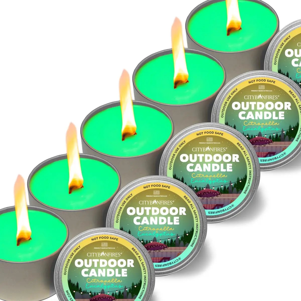City Bonfires Outdoor Candles Citronella Eucalyptus in metal tins, 6 teal candles lit outdoors on Tampa Home & Garden Store