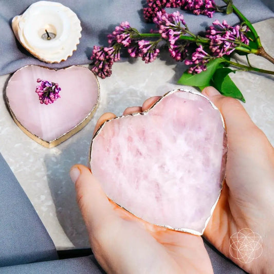 The Positive Energy Coasters Two Pack pink heart-shaped geode coasters with gold rims on Tampa Home & Garden Store