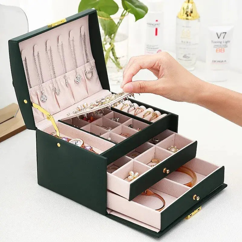 Leather jewelry box in green with velvet-lined pink drawers and multiple compartments on Tampa Home & Garden Store