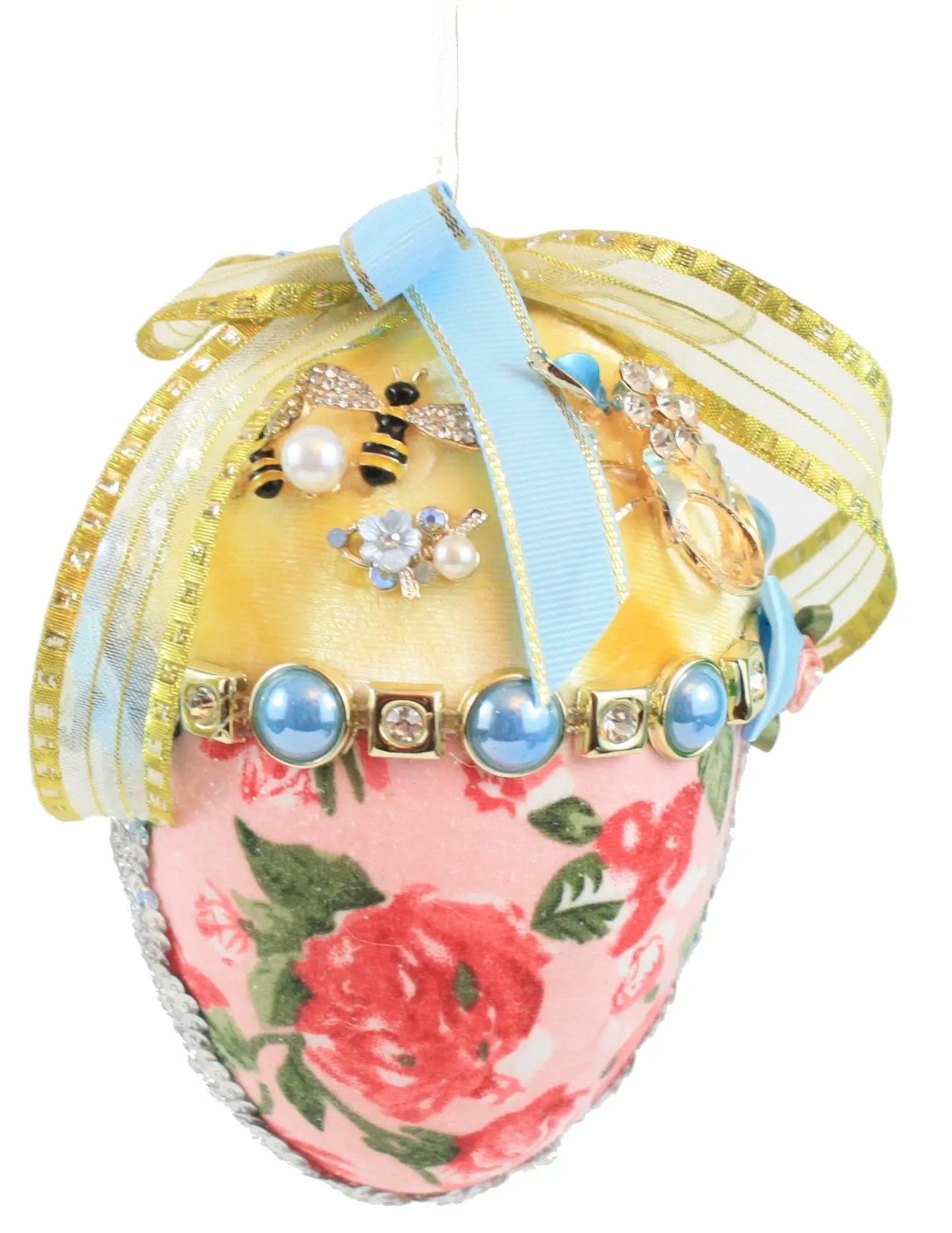 Flower Royal Court Egg Yellow v2 ornament with blue ribbon and crystal accents on pink base on Tampa Home & Garden Store