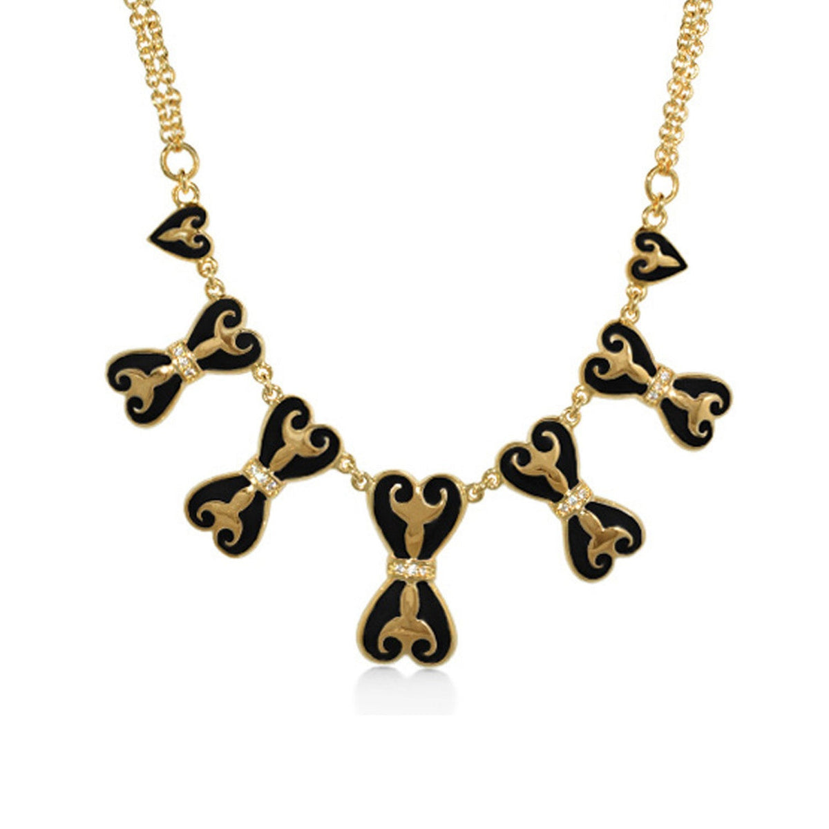 Bows and Hearts Necklace by Lauren G Adams with black enamel heart bows on a gold chain on Tampa Home & Garden Store