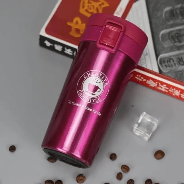 Stevvex travel mug stainless steel magenta with screw lid, reflective tumbler on gray surface on Tampa Home & Garden Store