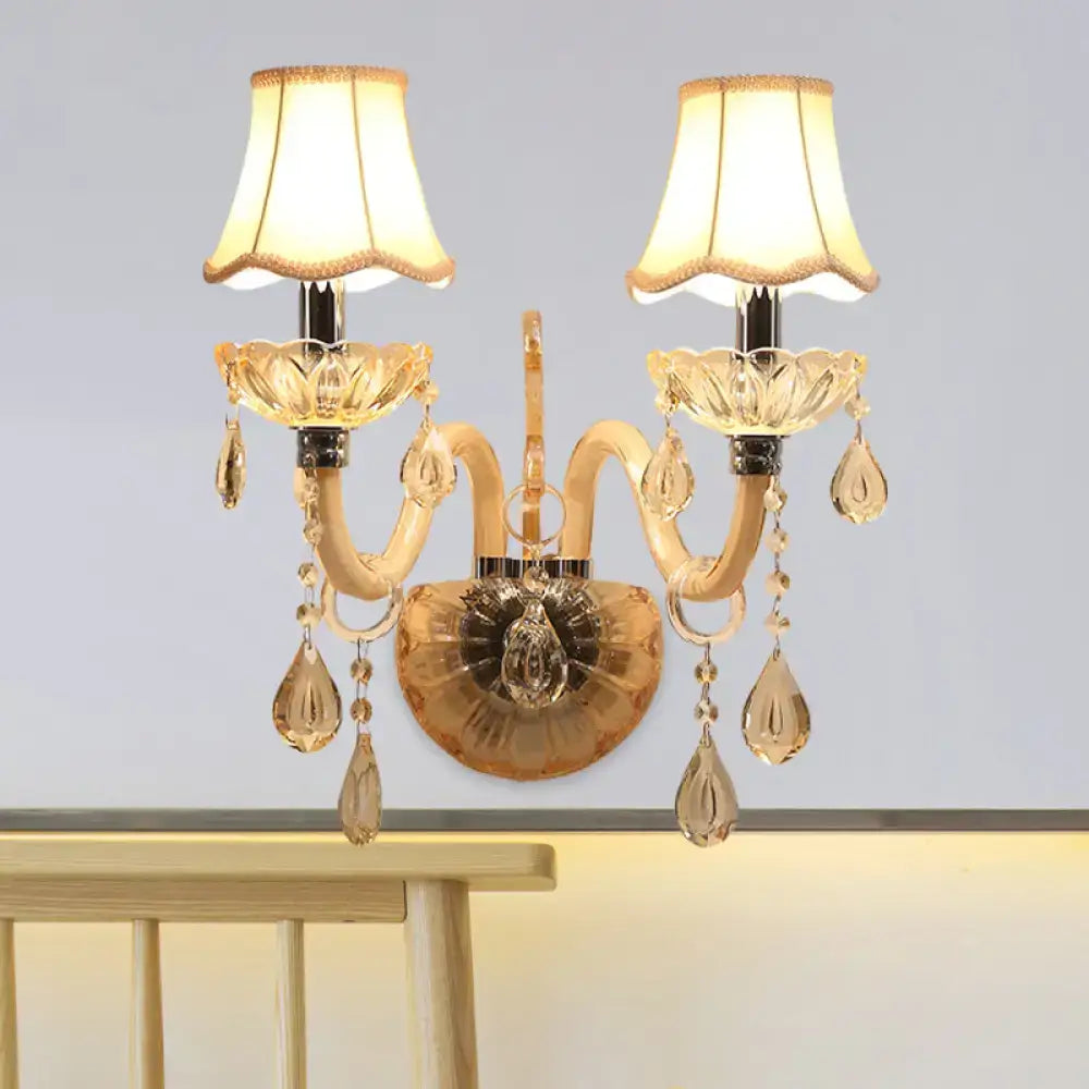 Amber glass candle sconce with scalloped fabric shades, dual-arm wall light with crystal drops on Tampa Home & Garden Store