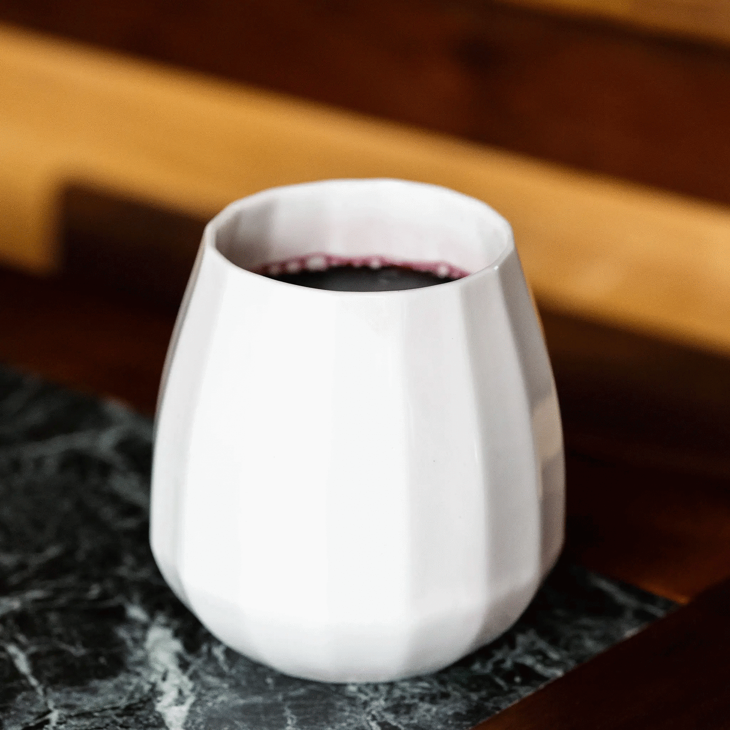 Translucent porcelain wine glass with a ribbed white body Ember Collective drinkware on Tampa Home & Garden Store