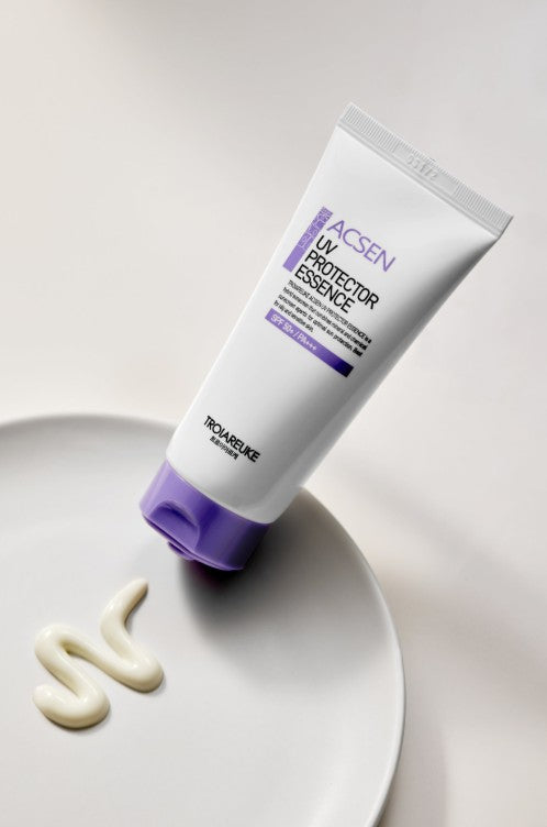 TROIAREUKE UV Protector Cream sunscreen tube SPF50+ PA+++ with purple cap on plate on Tampa Home & Garden Store