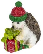 Holiday Hedgehog charm with Christmas present, red knit hat, green trim on Tampa Home & Garden Store