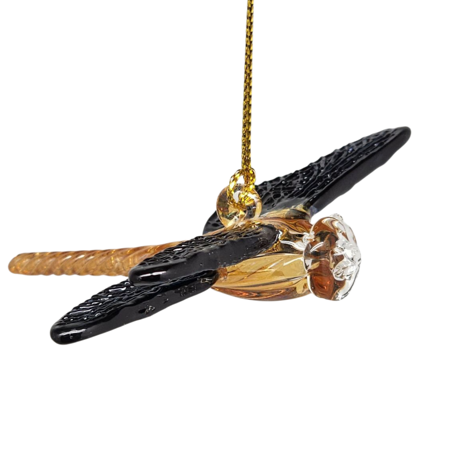 Egyptian Glass Dragonfly ornament with black wings and amber body on a gold cord on Tampa Home & Garden Store