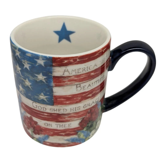 Old Glory 14oz mug with American flag pattern, blue star interior, ceramic with black handle on Tampa Home & Garden Store