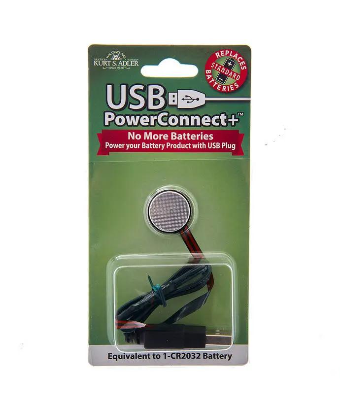 USB PowerConnect+ CR2032 battery adapter on green Kurt Adler card with coin cell USB plug on Tampa Home & Garden Store