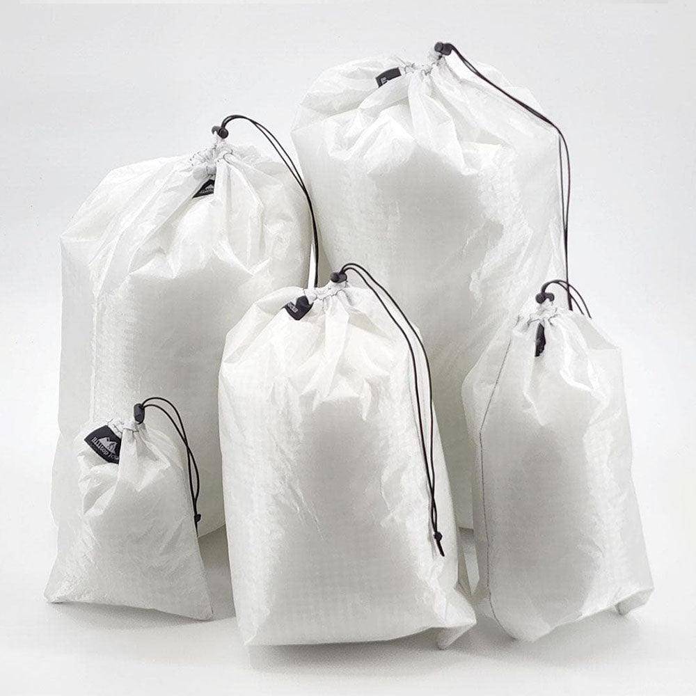 Ultralight stuff sacks (5) in sizes, white D50T fabric gear organizers with black drawcords on Tampa Home & Garden Store