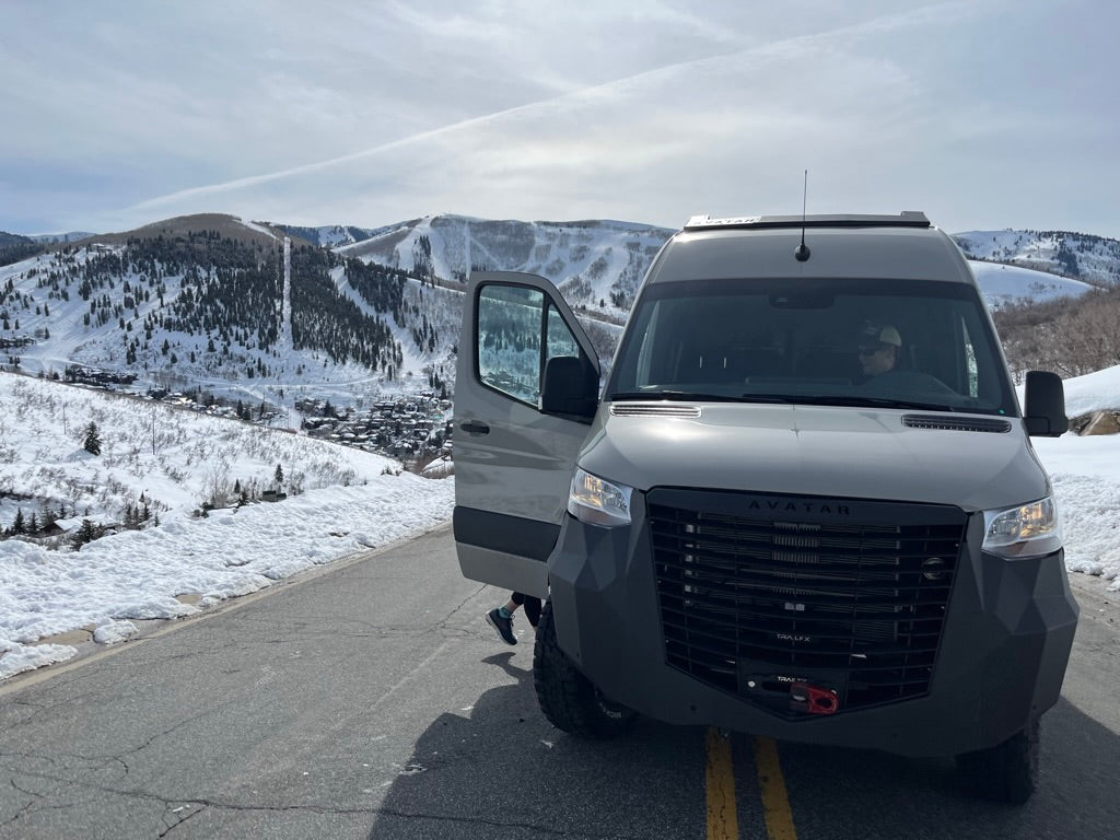 The Ultra Rack roof rack for Sprinter vans gray avatar offroad on snowy alpine road on Tampa Home & Garden Store