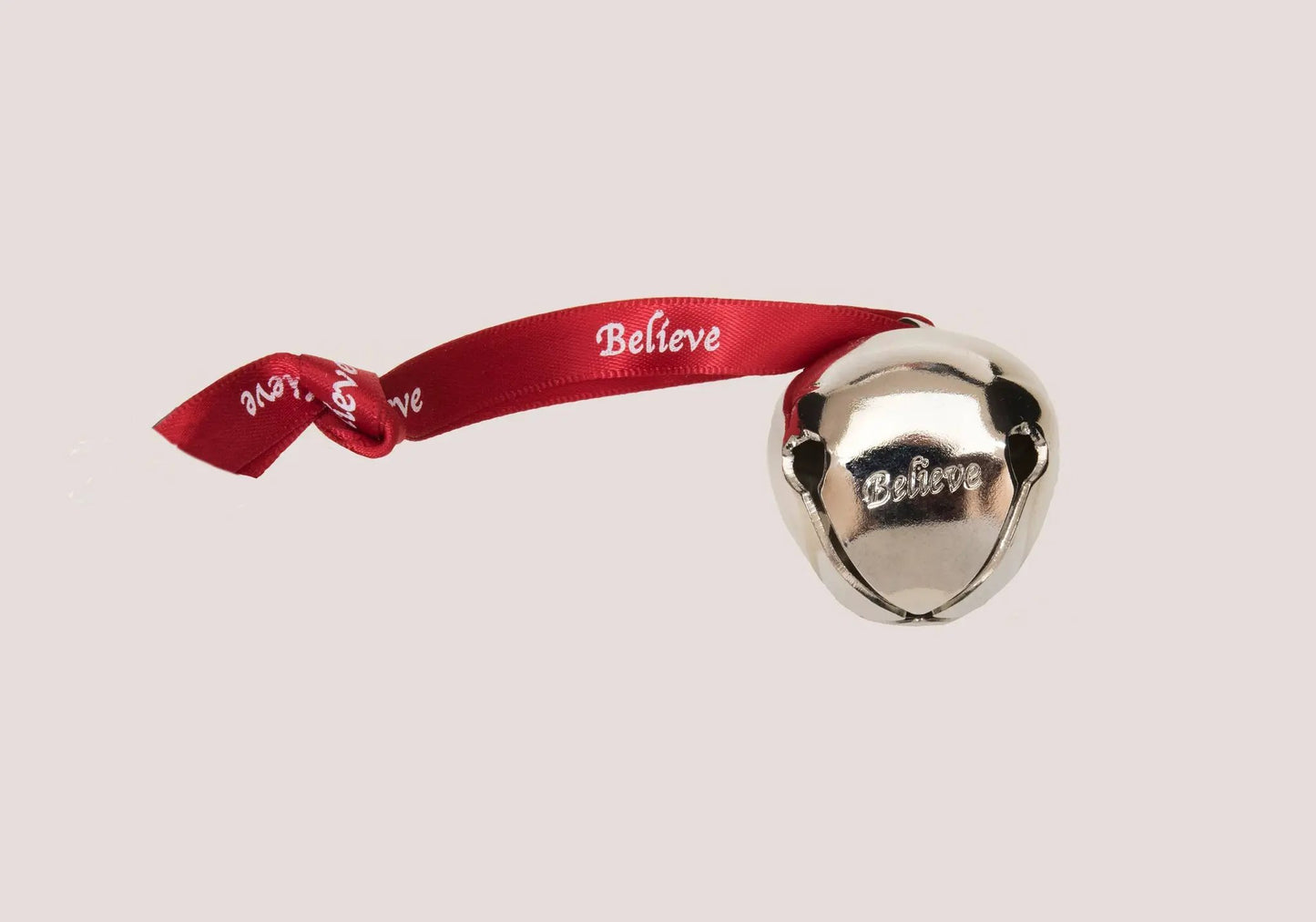 Believe Sleigh Bell ornament with red ribbon, silver bell on Tampa Home & Garden Store