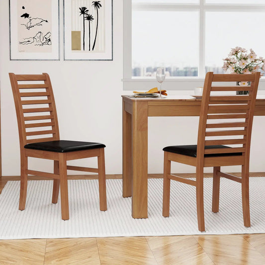 Set of 2 dining chairs with natural rubber wood legs and black cushioned seats on Tampa Home & Garden Store