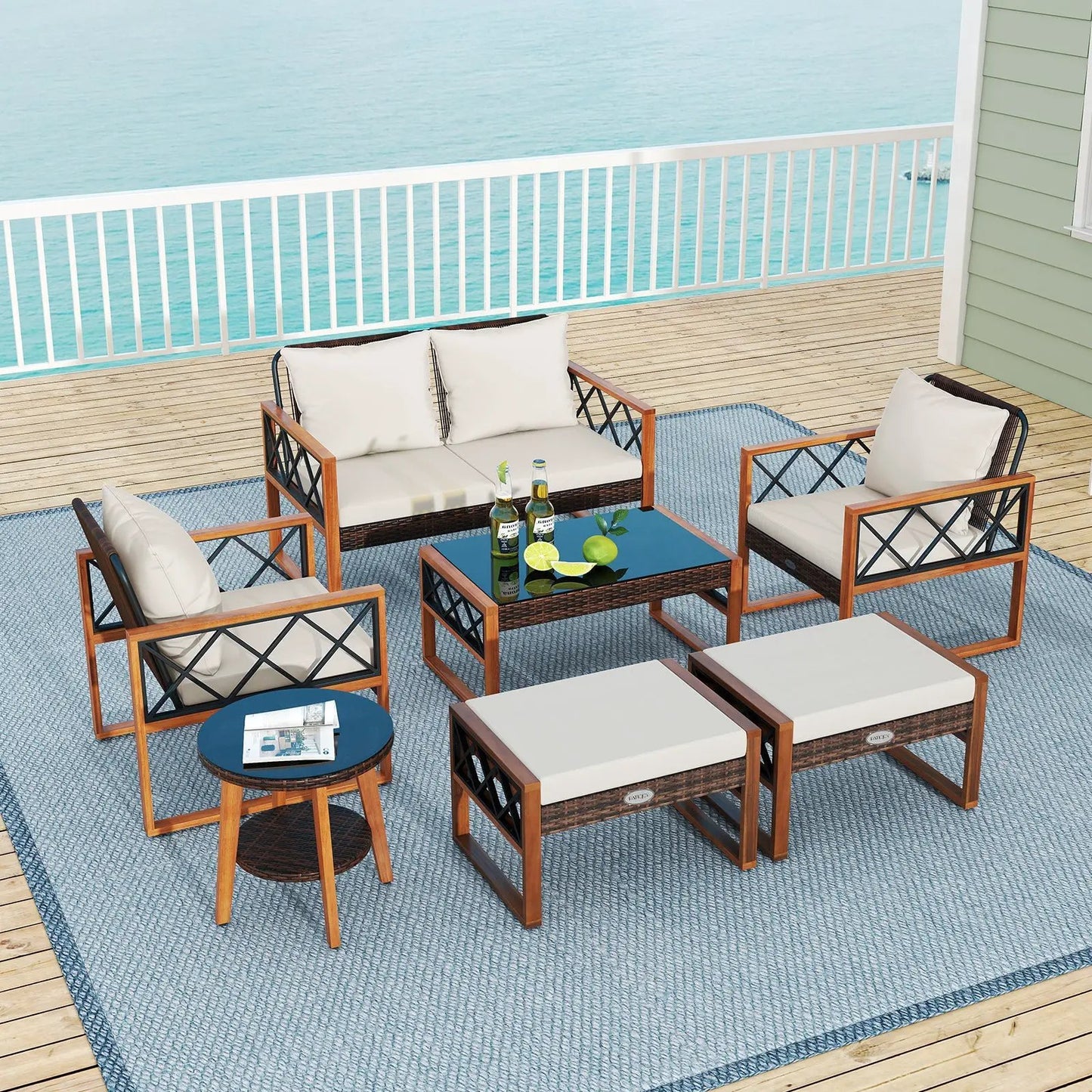 7-piece wicker and acacia wood patio set with beige cushions and glass-top coffee table on Tampa Home & Garden Store