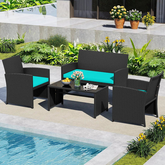Four-piece black wicker patio set with teal cushions and tempered glass tabletop on Tampa Home & Garden Store