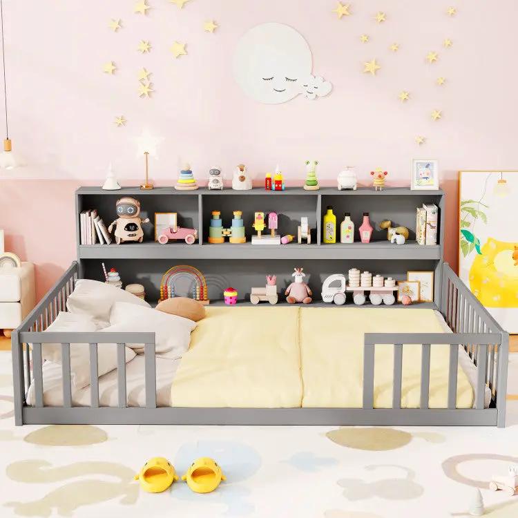 Gray Montessori twin floor bed with toy storage shelves and a bookcase in a pastel nursery on Tampa Home & Garden Store