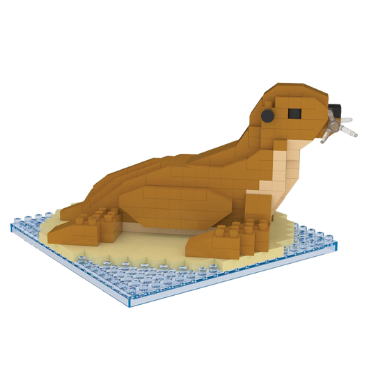 Mini Building Blocks Sea Lion Model built from tan bricks on a sandy base with a blue border on Tampa Home & Garden Store