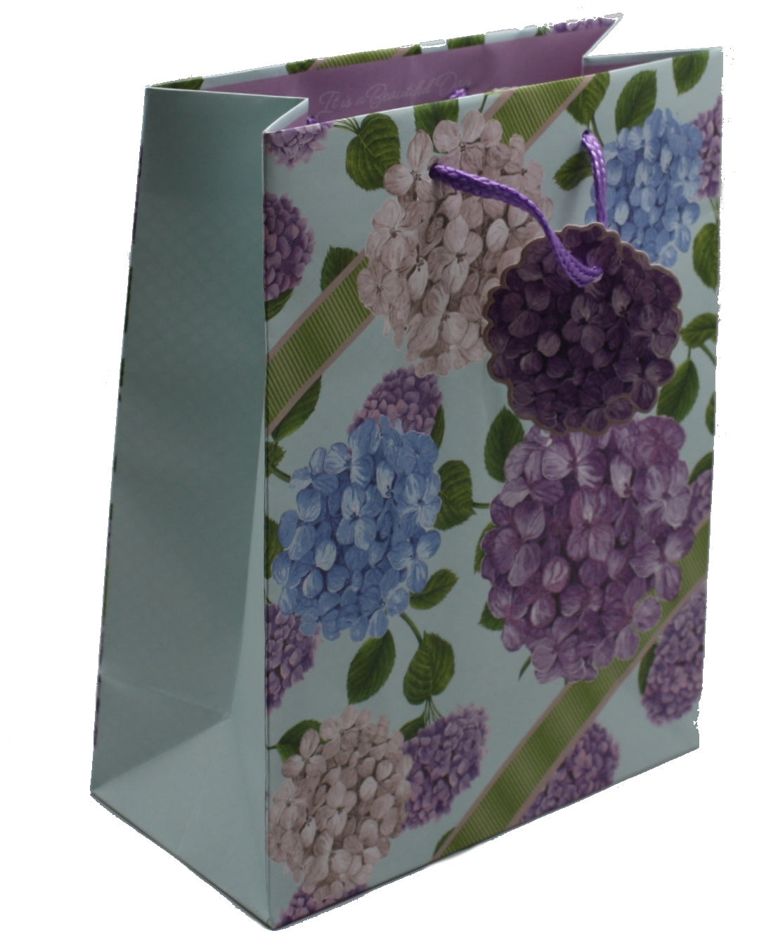 Hydrangea print glitter gift bag with purple cord handles and blue-green sides on Tampa Home & Garden Store