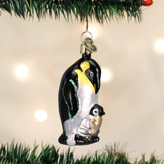 Emperor Penguin With Chick glass ornament, black penguin with yellow beak and glitter accents on Tampa Home & Garden Store