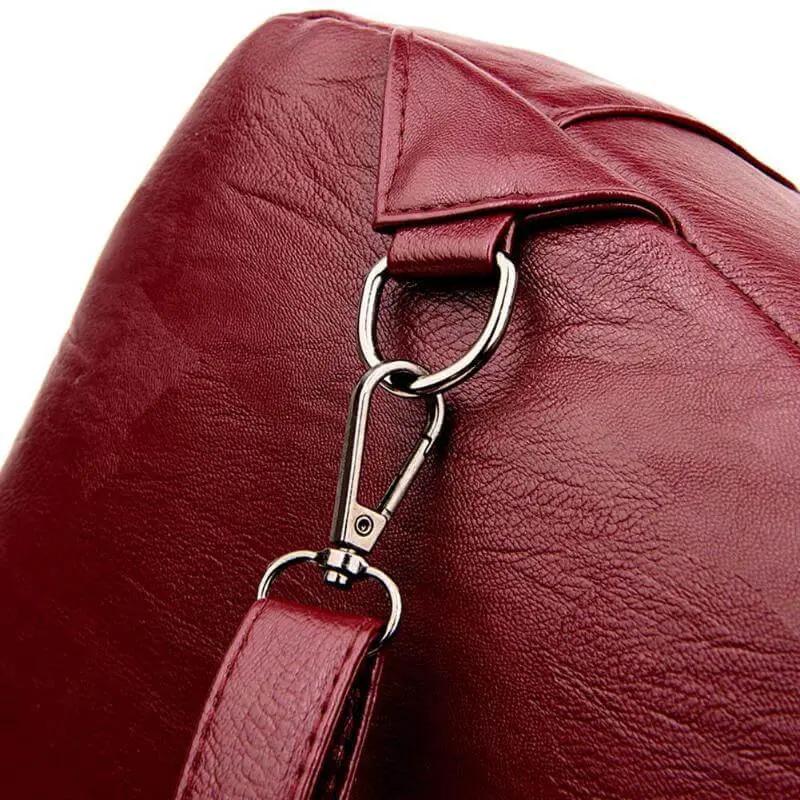 Genuine leather anti theft backpack burgundy with metal lobster clip and strap on Tampa Home & Garden Store