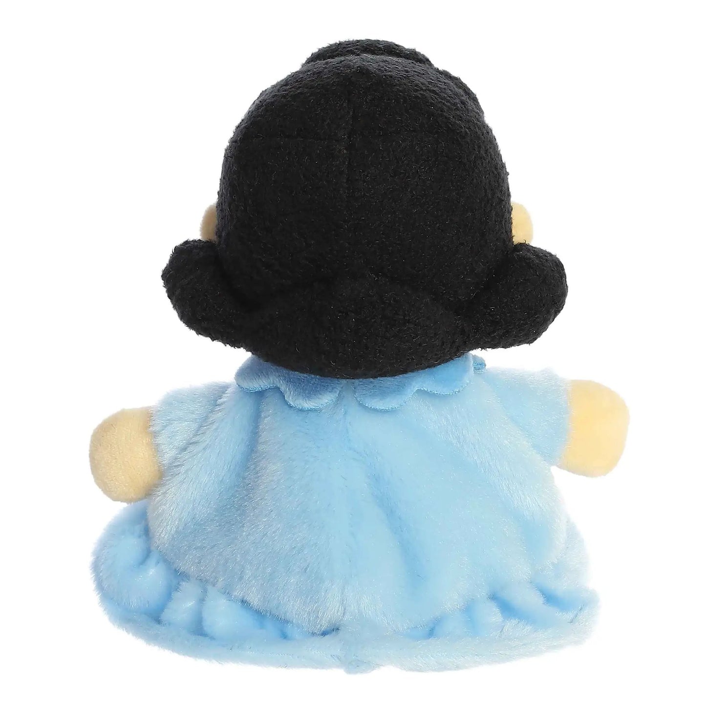 Lucy Palm Pal 5-inch plush Peanuts character with black hair and blue dress, back view on Tampa Home & Garden Store