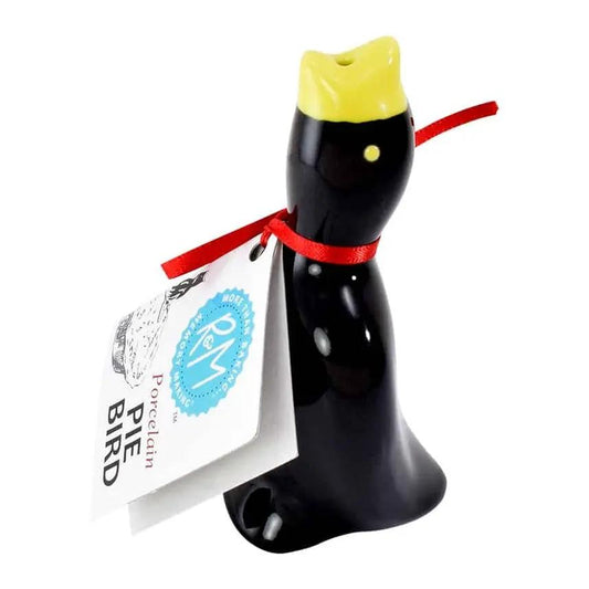 Porcelain Pie Bird by The Country Christmas Loft, black with yellow beak, red ribbon on Tampa Home & Garden Store